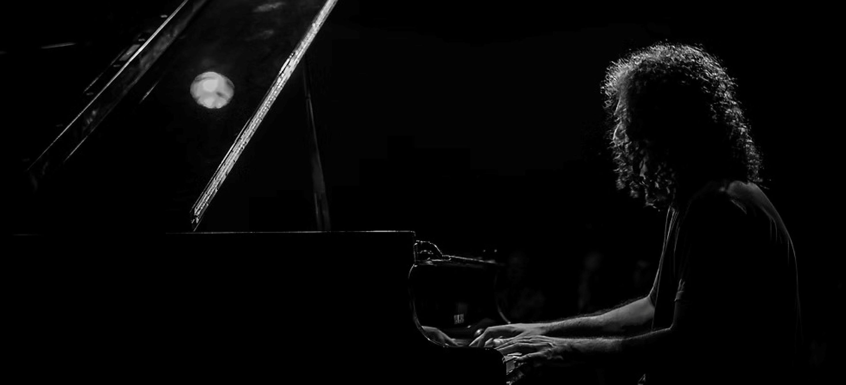 musician playing piano
