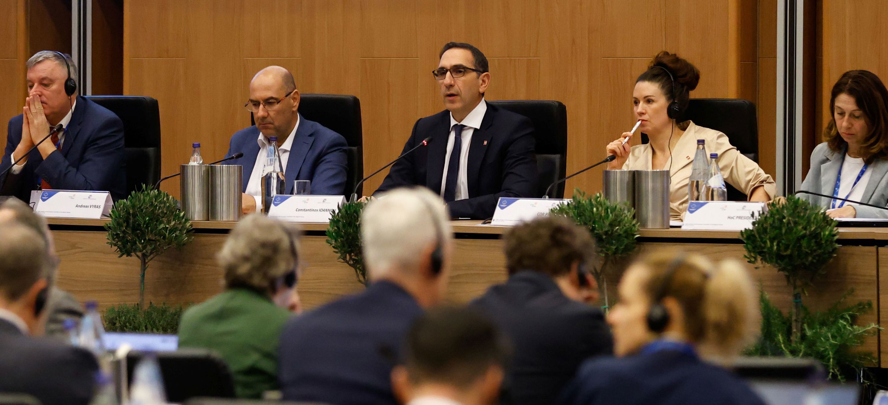 people sitting on podium 