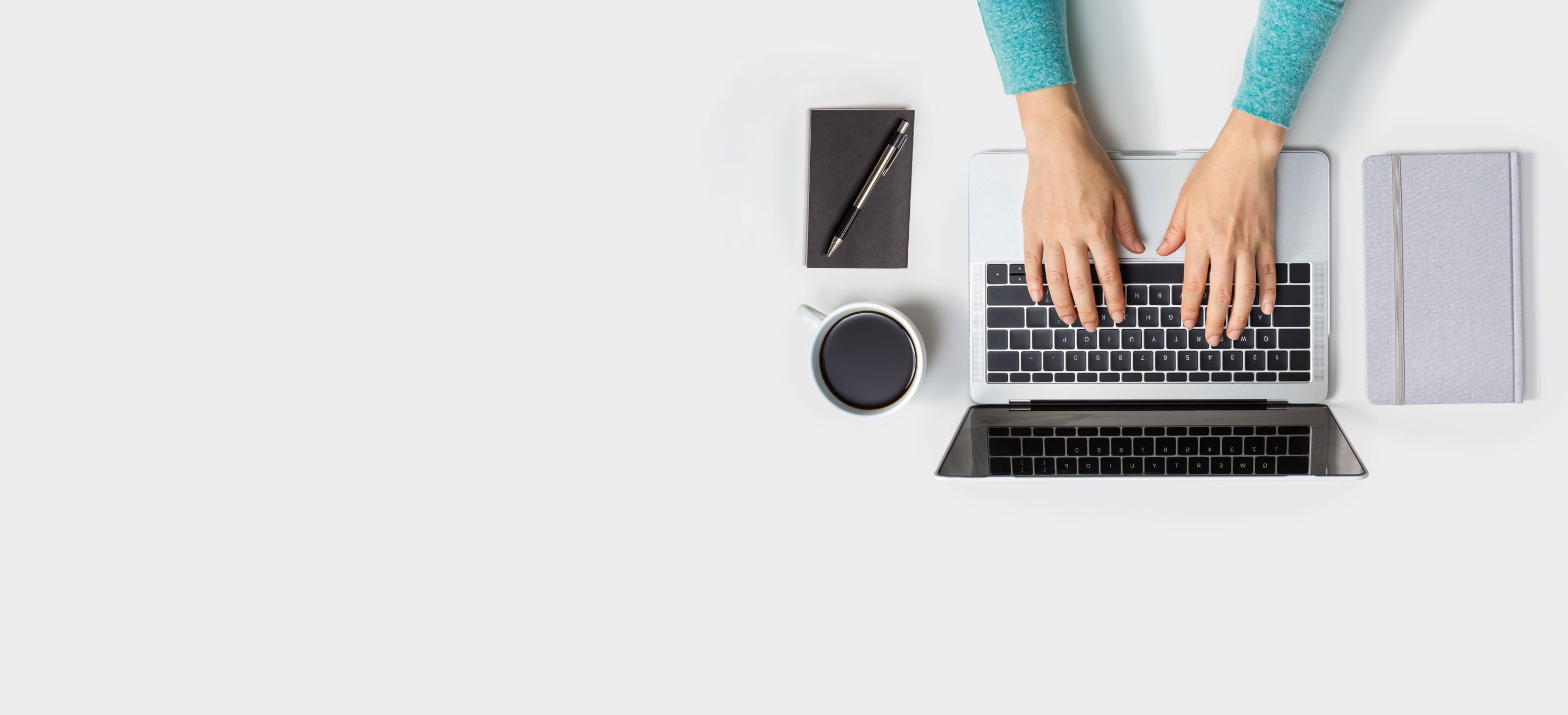 Person using a laptop, seen from above