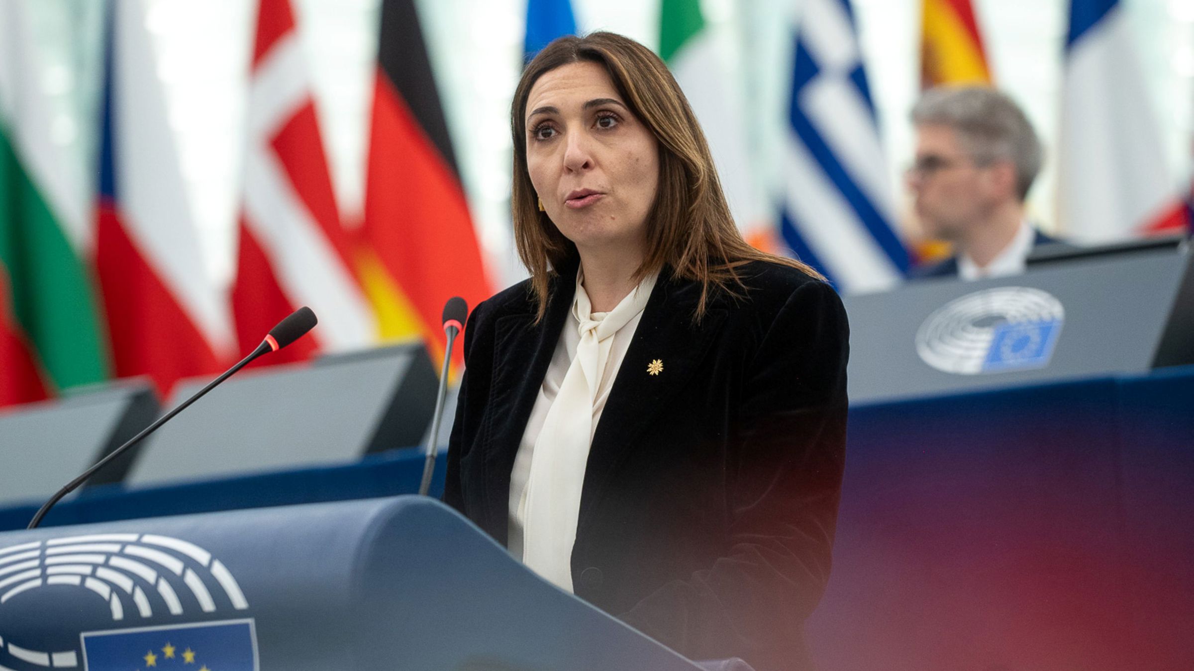 Woman speaking on podium