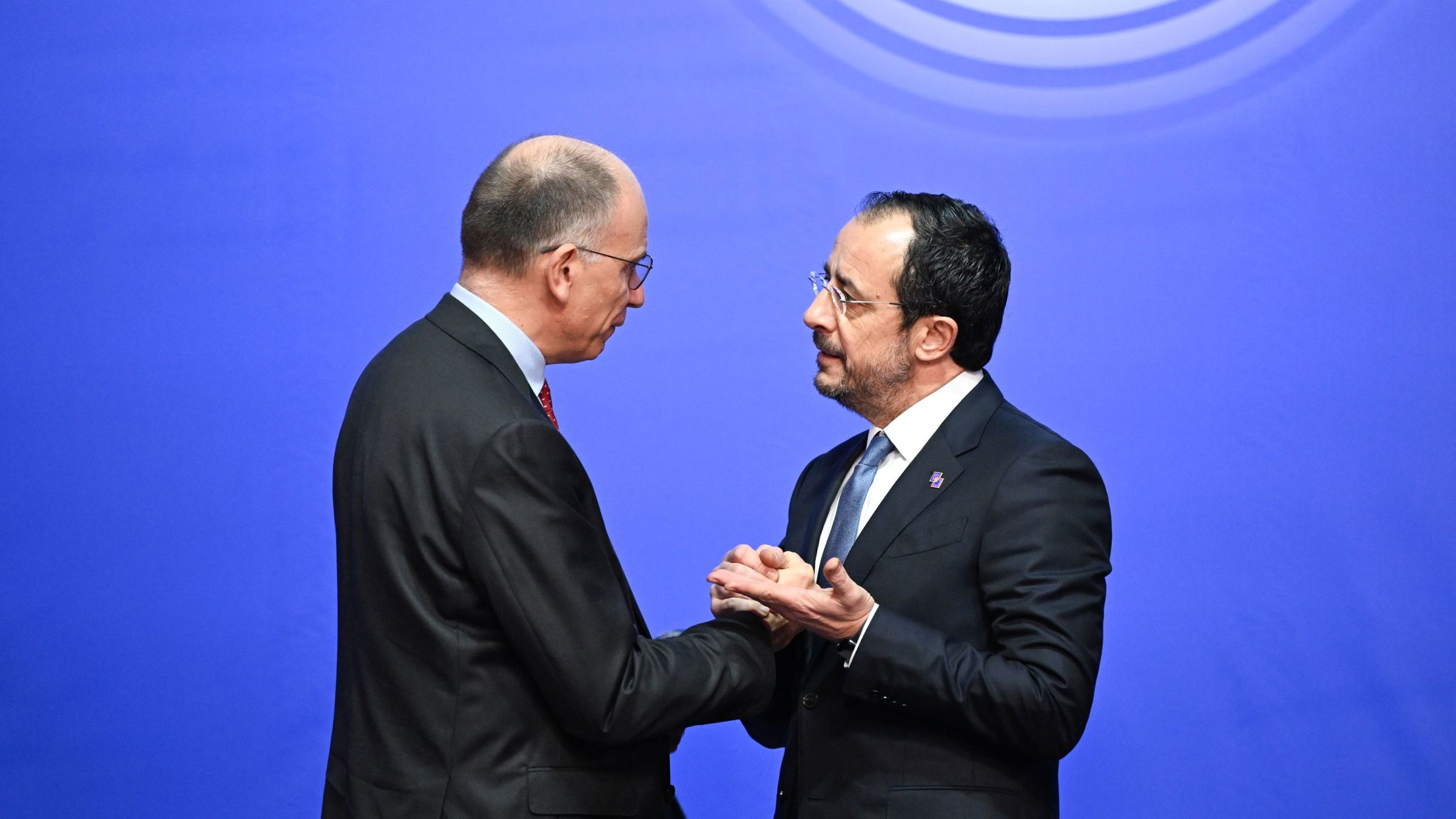 President Christodoulides with Enrico Letta, shaking hands 