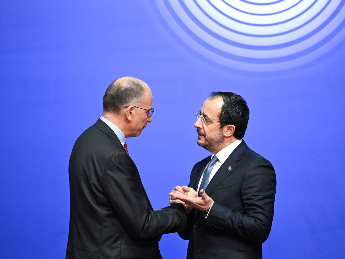 President Christodoulides with Enrico Letta, shaking hands 