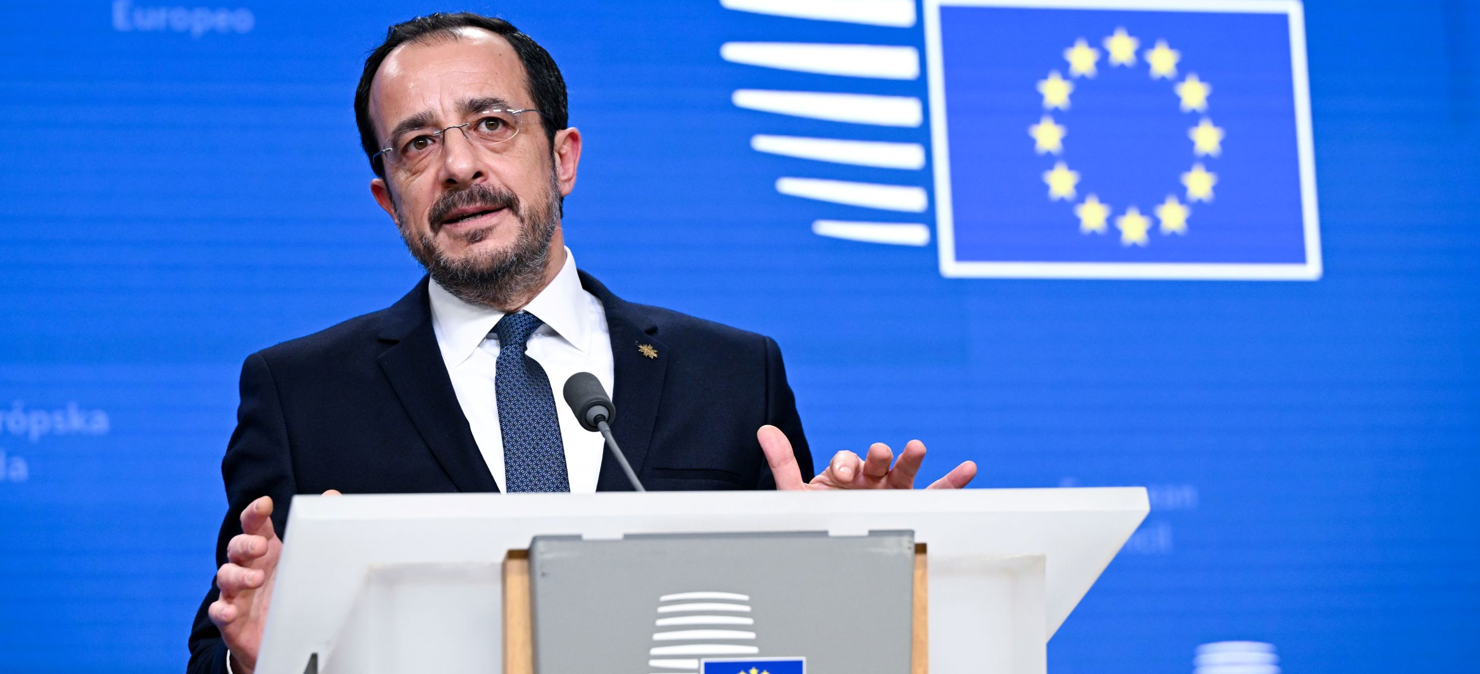 President Christodoulides speaking at the podium