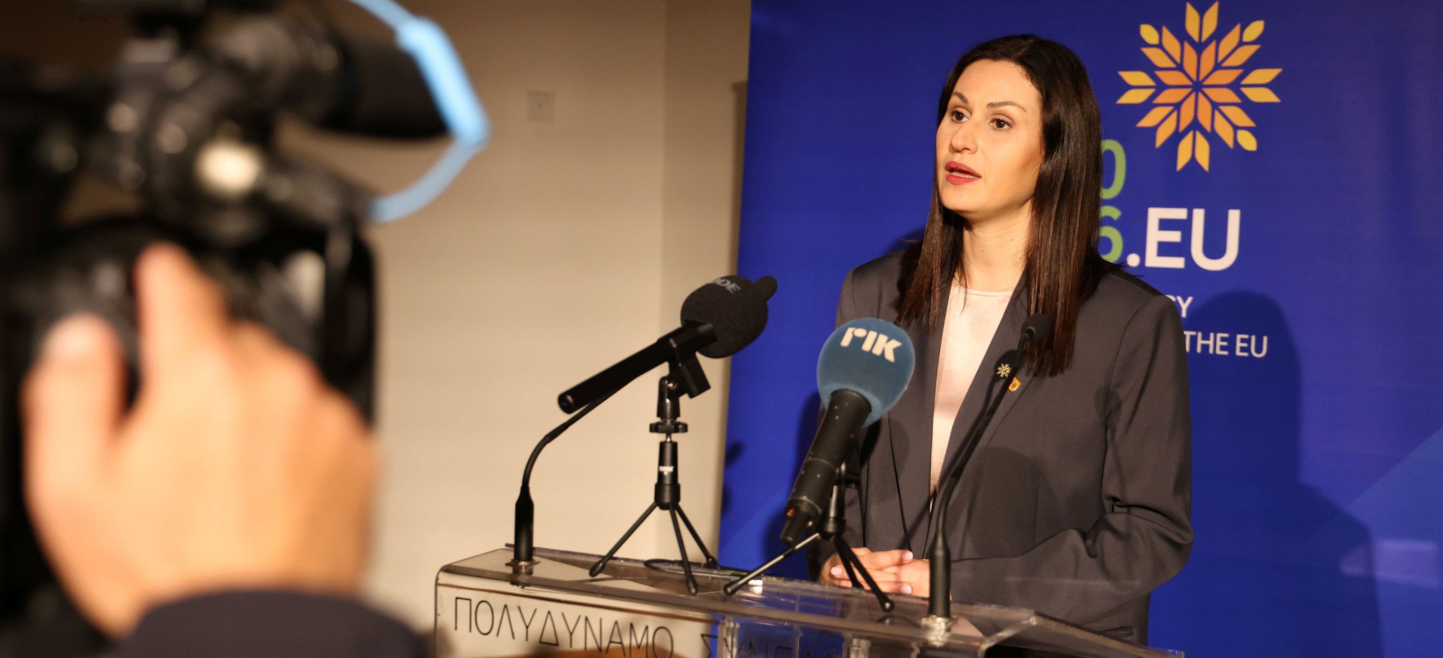 Minister Panayiotou on podium