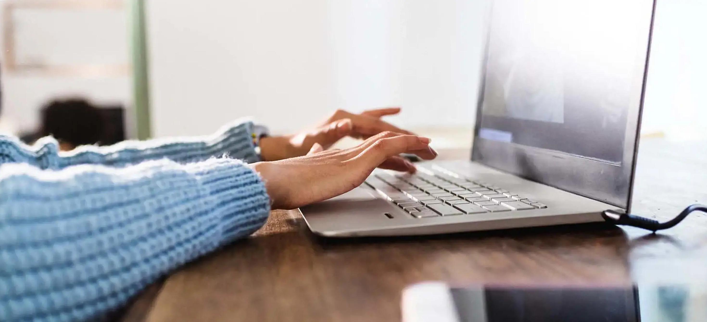 Woman working on a laptop